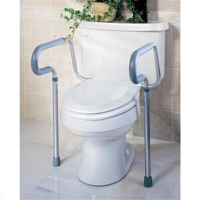White toilet with metal safety rails in a bathroom setting Medline Toilet Safety Rails